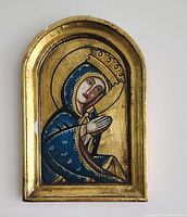 Front view of the cubist icon painting of Mary in blue and gold with arched gold frame, showing minor chips on frame edges.