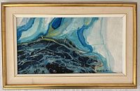 Full view of framed abstract seascape painting by Jehuda Jordan showing blue and white textured waves.