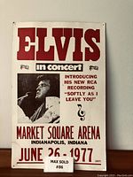 Vintage large lobby card for Elvis Presley concert at Market Square Arena, dated June 26, 1977, with minor wear and discoloration.