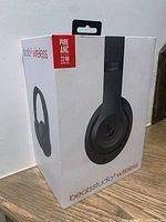 Front and side view of sealed Beats Studio3 Wireless headphones box showing Pure ANC and 22 HR battery life label