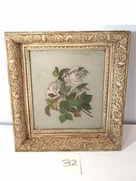Front view of framed still life painting of roses showing detailed flower and leaf design and overall frame condition.