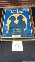 Framed vintage sheet music art titled 'Since My Honey Man Came Home' showing a silhouette of a couple with yellow moon and blue background.