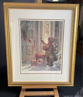 Full frontal photo of the framed limited edition print showing the entire artwork, frame, and stand.