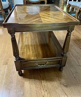 Front view of Drexel Italian series square wood end table showing top surface, drawer, and legs.
