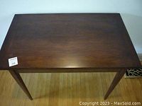 Top view showing the dark walnut finish and rectangular shape