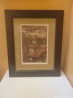 Full view of framed art etching showing composition and frame condition