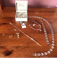 Full lot on wooden surface showing all items together