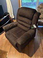 Front side angle view of chair in upright position