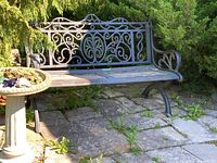 Full front view of bench showing frame design and seat