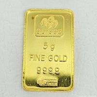 Front of bar showing PAMP Suisse logo, weight and fineness markings