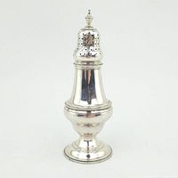 Front view of bell-shaped sterling silver sugar shaker