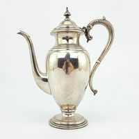 Front view of silver teapot