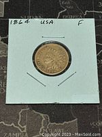 Front of the coin showing the obverse with the Indian Head design and date 1864.