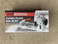 Front view of Drill Master Portable Pocket Hole Jig Kit box showing the product image and brand.