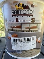Front label of Raimondi Tile Leveling System bucket showing brand, logo, and product information.