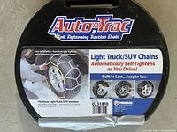 Front view of the tire chain set case showing branding, product details, and compatible tire sizes.