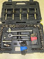 Full view of complete socket set and hex wrenches in molded black plastic case showing all items arranged in designated slots.