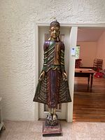 Full front view of entire statue and base