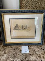 Framed original drawing showing Pyramid Caius Cestius and Gate of Saint Paul in Rome, in blue-gray decorative frame with gold inner edge.