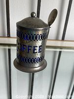 Silver plated coffee cannister with blue glass insert and 'COFFEE' lettering
