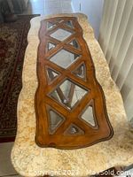 Overhead view of marble top and mahogany lattice with glass insets