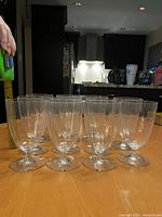 Photo showing a cleared view of 11 crystal glasses grouped together on a table
