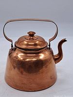 Photo of the full copper kettle showing body, handle, spout, and lid