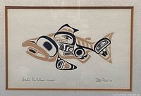 Full view of unsigned print showing the Haida Dog Salmon design, signature, and title on textured paper inside the frame.