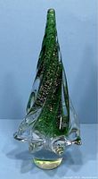 Front angle of vintage green and clear art glass Christmas tree figurine showing height and design