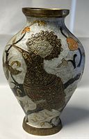 Front view of the brass cloisonné vase showing peacock and floral details.