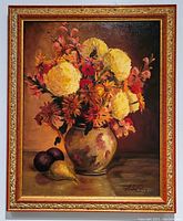 Front view of the original oil painting showing flowers in the ornate frame, signed Andre Roy