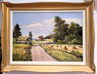 Framed original oil painting showing a rural landscape with houses and haystacks, featuring a partly cloudy sky and greenery.