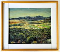 Framed oil painting showing full landscape with rolling hills and bold greens, yellows, and browns under a soft blue sky.