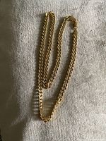 Necklace laid flat showing full length and shape