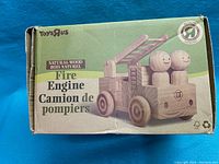 Box of the fire engine toy showing the product image and branding