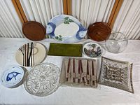 Full lot showing large fish platter, wooden platters, glassware, chopsticks, and decorative plates