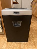 Front view of Fellowes paper shredder with visible shredder bin window.