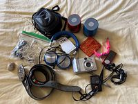 Full lot overview showing all included items arranged on a beige surface