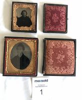 Lot showing front and back of both antique photographs in decorative cases with plush fabric interiors.