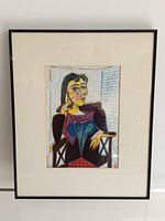 Frontal view of Picasso Portrait of Dora Maar art print framed, showing full piece in black frame with white mat and detailed colorful Cubist portrait.