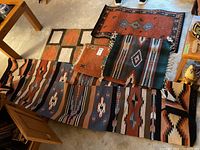 View of all six rugs laid out showing patterns and relative sizes.