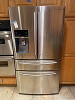 Full front view of Samsung stainless steel French door refrigerator