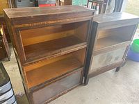 Both barrister bookcases side by side: three-tier unit left, two-tier unit right