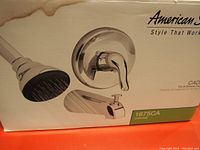 Box showing product image of American Standard Cadet tub/shower faucet set, model 1675CA, with chrome finish and lever handle.