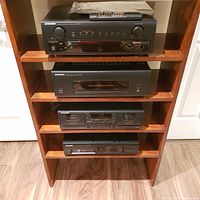 Four Pioneer components installed in wooden shelf: CX-770, M-770, CT-W770 and PD-M403