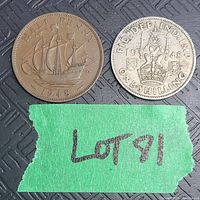 Both coins side by side on a textured background with green tape labeled 'Lot 91'