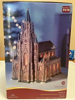 Original box front showing detailed photo of Cathedral Church Christmas Village collectible, vintage 2006 Traditional Vintage Collection with retail sticker $18.96.