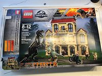 Box front showing Lego Jurassic World Inindoraptor Rampage at Lockwood Estate set 75930 with 1019 pieces, recommended for ages 8-12, featuring building and character art.