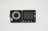 Front view showing lens closed, built-in flash and control buttons