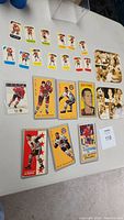 22 Chicago Blackhawks hockey cards arranged on white table showing Post Minis, Parkhurst reproductions, Power Play and Esso All-Star cards.
